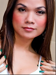 Lovely ladyboy Beer in a white gown and red undies